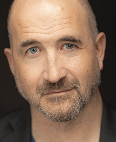 Headshot of Travis Mitchell